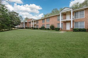 a large lawn in front of a house