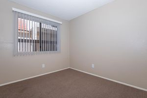 unfurnished carpeted bedroom