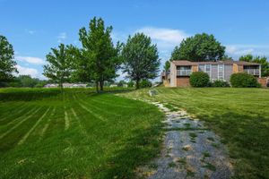 a large lawn in front of a house