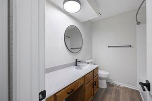 a restroom with a sink and a mirror