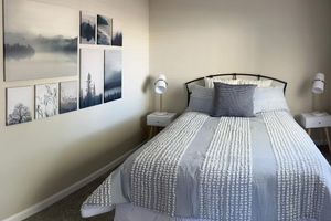 a bedroom with a bed in a hotel room