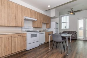 a kitchen with a wood floor