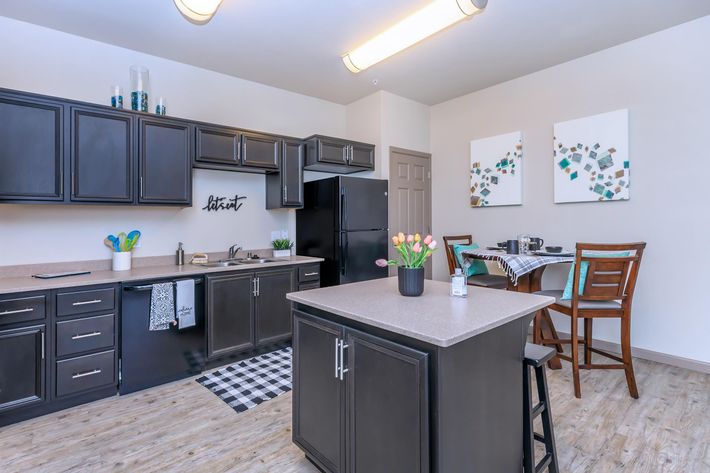 FULL-SIZED KITCHEN COMPLETE WITH ISLAND, PANTRY, AND DINING AREA IN HANFORD, CALIFORNIA