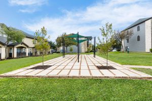 Iron Rock Ranch community courtyard with green trees