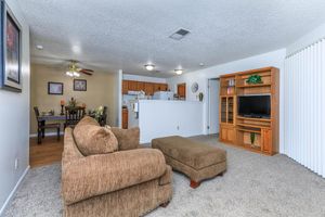 furnished apartment with carpet