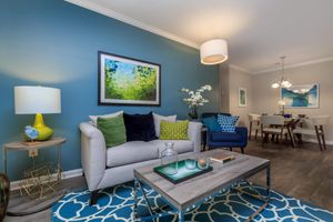 Updated Living Space with Wood-Style Vinyl Flooring + Ashley Oaks Apartments + San Antonio + Texas