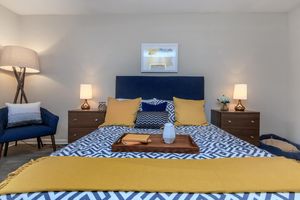 Updated Bedroom with Wood-Style Vinyl Flooring + Ashley Oaks Apartments + San Antonio + Texas