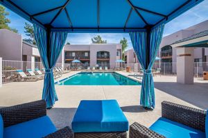 Poolside lounge area with cabana at Azul Apartments in Phoenix, Arizona