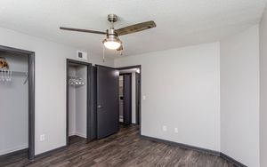 Northwood Park Apartment bedroom with closet and ceiling fan two tone paint