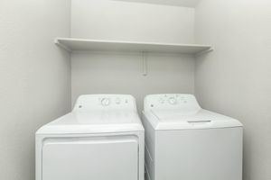 FULL-SIZED NEW WASHER AND DRYER IN HOME