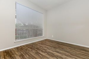 unfurnished dining room with wooden floors