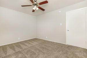 unfurnished bedroom with carpet