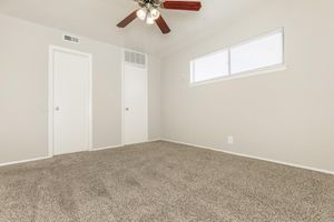 unfurnished bedroom with a window