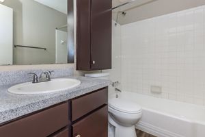 unfurnished bathroom with wooden floors