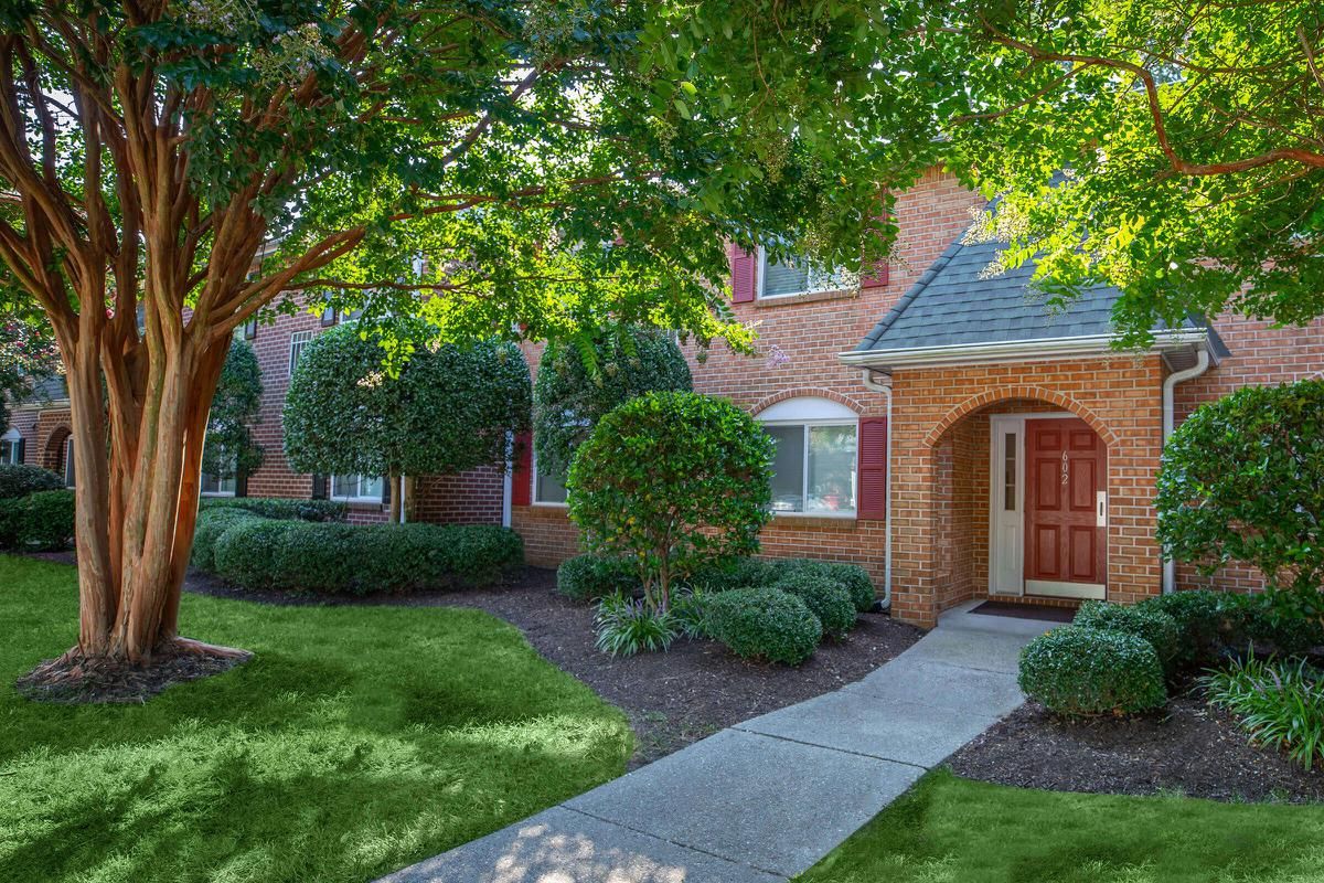 a large lawn in front of a house