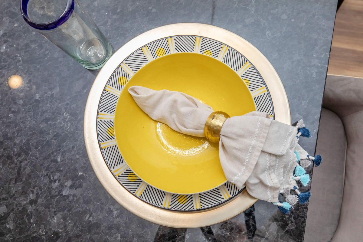 a plate with a banana on a table