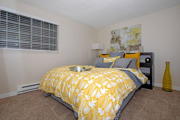COMFORTABLE BEDROOM AT ENCORE APARTMENT HOMES