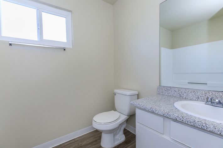 Bathroom with grey countertops