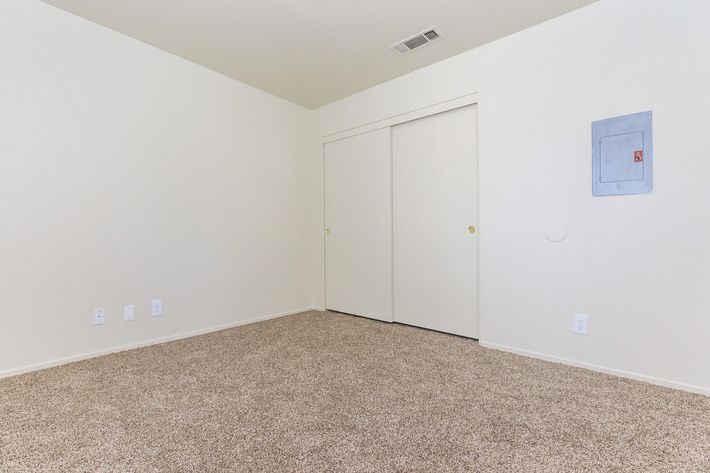 Unfurnished carpeted bedroom