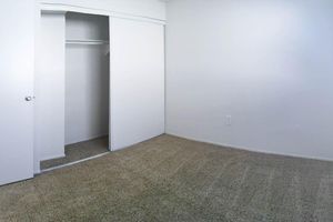 a white refrigerator freezer sitting in a room