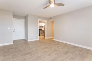 BEAUTIFUL HARDWOOD STYLE FLOORING AND CEILING FANS