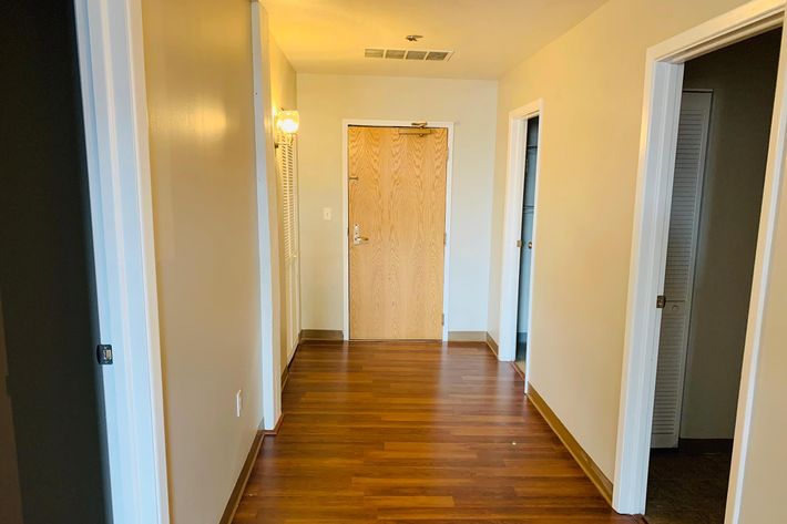a wood door in a room