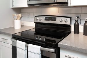 Modern stainless steel oven and stovetop