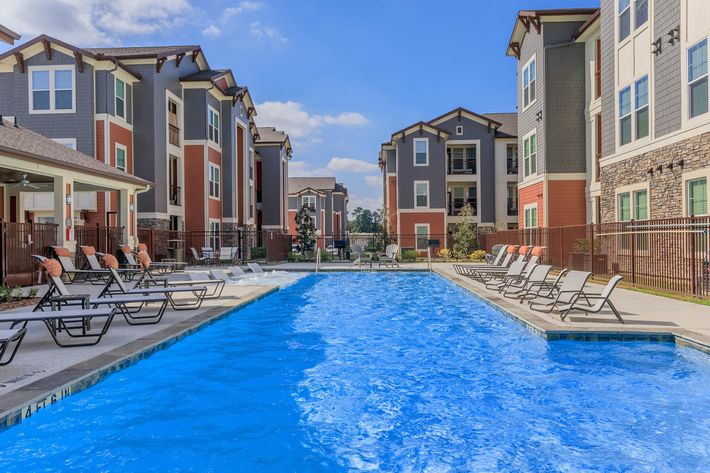 RELAX BESIDE OUR RESORT-STYLE POOL IN SPRING, TEXAS