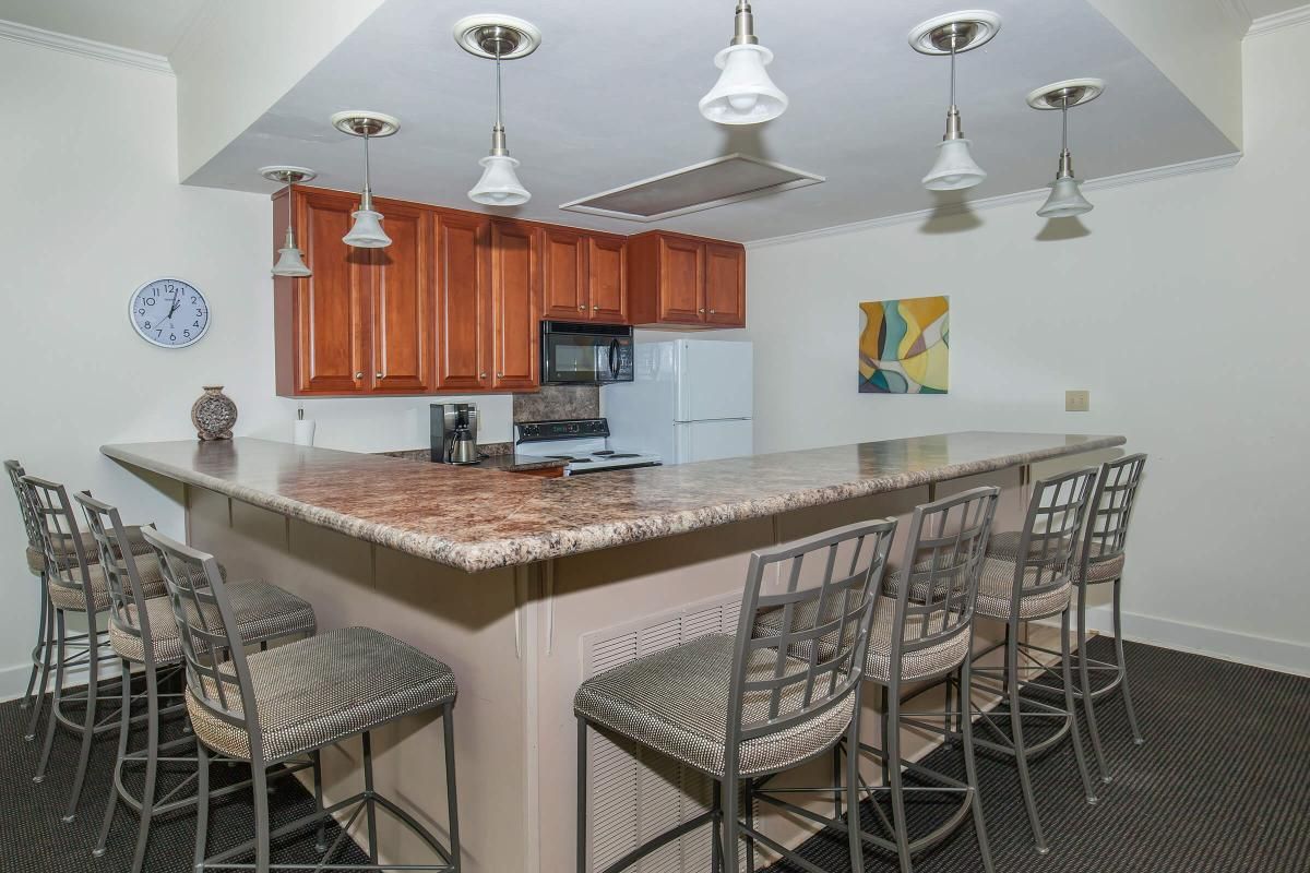 THE CLUBHOUSE IS A GREAT PLACE TO MEET YOUR FRIENDS AND NEIGHBORS AT PEBBLE CREEK APARTMENTS