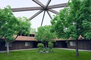 Community courtyard with green trees