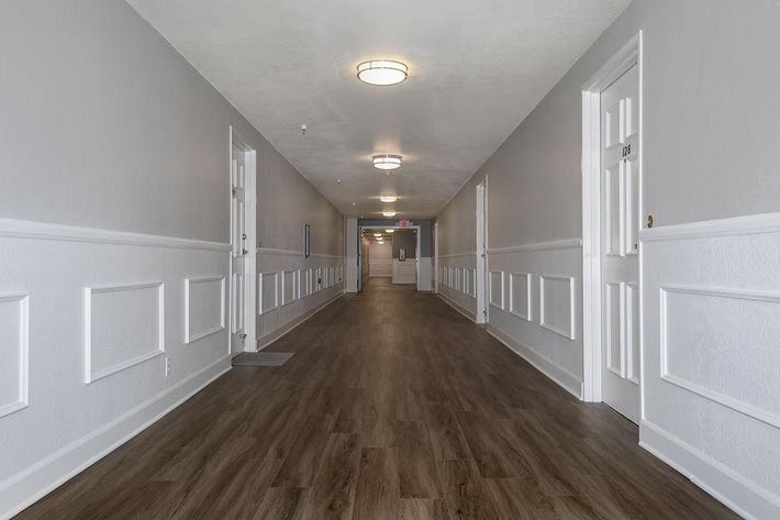 Community hallway with wooden floors
