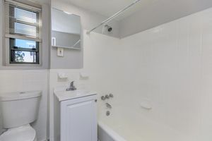 a view of the shower and sink