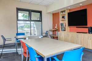 Community room with tables and chairs