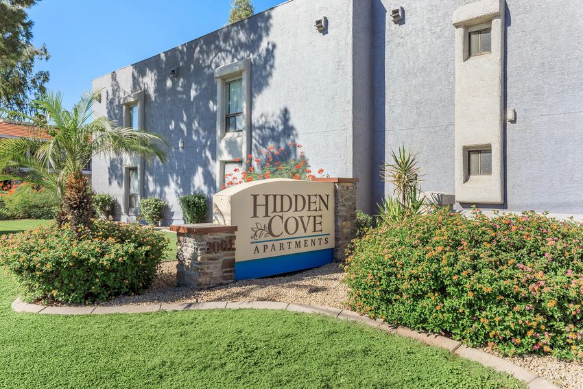 Building exterior at Hidden Cove Apartments.