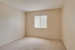 Cozy Bedroom with carpeted floors in Huntsville, AL