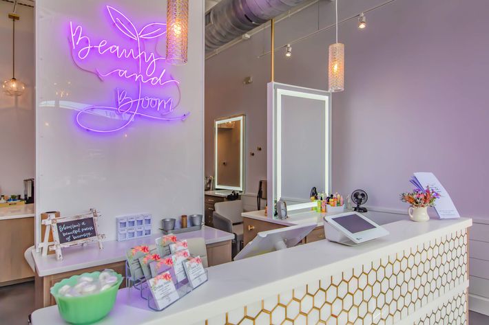 Beauty and Bloom's front desk at South Front In Wilmington, North Carolina.