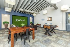 community room with a foosball table