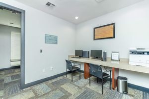 community computer room with desks and chairs