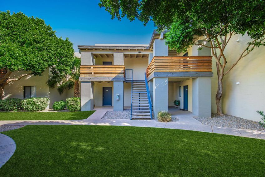 Apartment buildings and shared grounds at Palm Desert Apartments