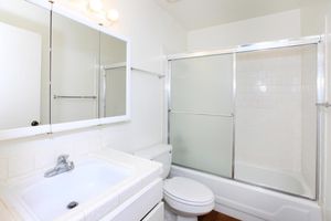 Bathroom with sliding glass shower door