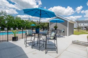 convenient outdoor seating by the pool at Chapmans retreat in Spring Hill, Tennessee