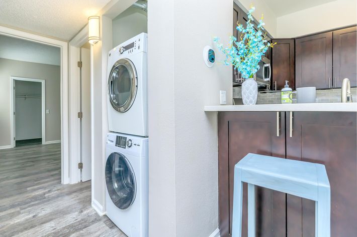 Laundry room at Copper Wood  Apartments in Chino, CA
