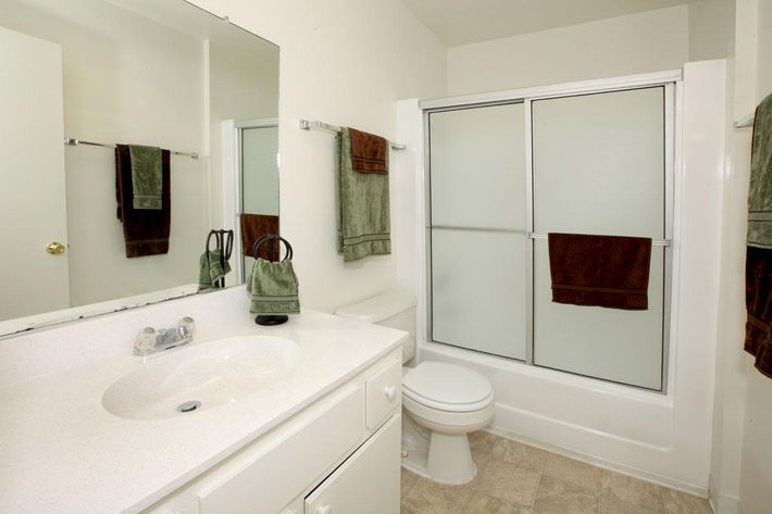 Bathroom with sliding glass shower doors
