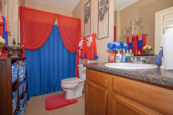 a bedroom with a shower curtain