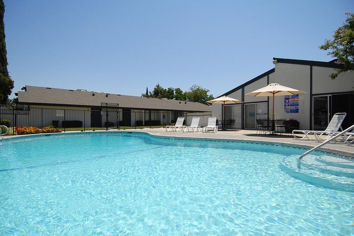 Take a dip in the pool at Westwood Apartments