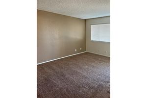 Vacant carpeted living room
