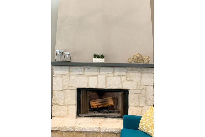 a fire place sitting in a room