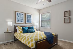 Bedroom with carpeted floors - Edgewater Village Apartments - Greensboro - North Carolina