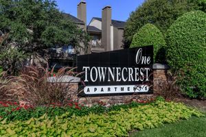 One Townecrest monument sign with green plants