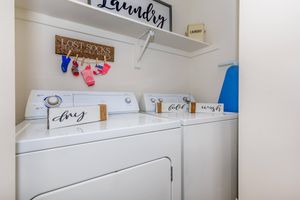 furnished washer and dryer in the laundry closet